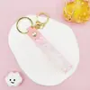 Llavero Colgante de Cordón de Cuero con Letra Transparente Brillante con Accesorios Estilo Muñeca Rellena de Aceite Encanto de Llavero Pulsera Venta al por Mayor