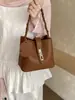 Bolsa de Balde Casual Portátil Transfronteiriça para Mulheres, Nova Bolsa de Ombro Moda Tendência 2026, Bolsa Transversal Simples e Única de Nicho