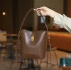 Bolsa de Mão de Moda de Luxo Feminina 2024 Nova Vintage Simples Trava Saco de Balde Nicho Transversal Bolsa de Ombro