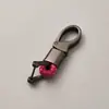 Llavero de cuerda trenzada de fábrica, accesorios de ferretería, hebilla de herradura, colgante para llave de coche, accesorios de moda para coche