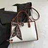 Bolsa Grande de Nicho Estilo Coreano para Mulheres 2026 Novo Modelo Bolsa de Ombro Único Transversal com Textura, Adequada para Aula e Trabalho Bolsa Tote