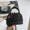 Otoño/Invierno 2026 Nuevo Estilo Lentejuelas Brillantes de Moda Bolso Pequeño de Concha Bolso Cruzado para Mujer Bolso de Hombro Único de Venta Caliente de Comercio Exterior