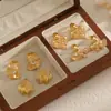 Pendientes de Acero Inoxidable con Textura de Hoja de Diamante Estilo Ins Transfronterizo Pendientes para Mujer Modernos de Gama Alta Pendientes de Acero de Titanio Oro de 18K