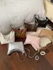 Bolso cruzado de un solo hombro de moda y con estilo 2026 transfronterizo, textura simple, nueva tendencia de verano, bolso único tipo empanada para mujer