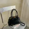 Bolso de mano de moda nuevo para mujer de verano, diseño de nicho, sensación de alta gama, gran capacidad, bolso Boston tipo almohada para hombro y cruzado