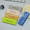 Nueva caja de gafas portátil con marco de patrón de nubes que cambia de color, hecha a mano con triángulo de compresión, moderna y sencilla con logotipo fijo.