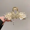 Elegante Pinza de Tiburón con Borla de Mariposa y Pedrería Floral 2026 Nuevo Modelo Pasador para Mujer con Recogido Exquisito