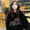 Estilo americano holgado adelgazante talla grande cubriendo la carne 2023 nuevo suéter para mujer Primavera Otoño Invierno versátil abrigo negro de manga larga