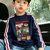 Nueva camiseta de manga larga de algodón puro con tres rayas, elegante y genial para niños, camiseta básica de corte holgado para niños para primavera y otoño