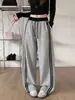 Pantalones de mujer con raya lateral azul marino, dobladillo curvo, nuevo estilo de otoño, engrosados, de cintura alta, holgados, adelgazantes, de caída suave, pierna ancha, estilo deportivo