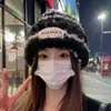 Gorro de punto de felpa gruesa para mujer, de lana resistente al frío, cálido, con protección para los oídos, para otoño e invierno, versión coreana pequeña, para cabeza grande.