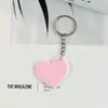 Llavero de goma suave, forma de corazón, caricatura, anime, celebridad, pareja, accesorio para bolso y mochila, disponible para venta al por mayor