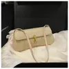 2026 Verano Nuevo Estilo Bolso de Hombro Tejido de Alta Gama para Axila Bolso de Mano Versátil Texturizado Bolsos de Mujer al por Mayor