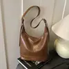 Bolsa de Viaje de Alta Gama para Mujer Tendencia Otoño/Invierno Moda Popular 2026 Nuevo Bolso de Hombro Cruzado Retro Bolso Cubo Cruzado