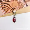 Suministro Exclusivo Transfronterizo de Llaveros Góticos Personalizados, Colgantes Metálicos Vintage, Alas de Corazón, Adornos de Cruz Oscura