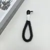 Fábrica de origem pulseira de pulso de pelúcia dopamina, chaveiro de shorts, pingente de acessório para boneca de pelúcia DIY