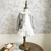 Conjunto Estilo Academia para Niñas Colección Primavera 26: Cárdigan de Punto Único Estilo Miu con Cuello Redondo y Patrón de Diamantes Combinado con Falda de Encaje