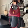 Bolsa feminina de alta qualidade, color-blocking, design de nicho, novo modelo 2025, bolsa de mão versátil para o dia a dia, bolsa de bolinho da moda