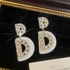 Aretes Europeos y Americanos Exagerados Transfronterizos de Nueva Llegada con Diamante Perla Flor Borla Aretes Lujo Ligero de Alta Gama Combinables para Mujer