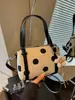 Bolso de mano de lunares estilo coreano para mujer, nueva moda 2026, bolso cruzado único y moderno estilo ins, bolso de hombro simple y texturizado