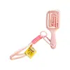 VEEJAGA Peine para el Cabello Estilo Meandro Hueco Macaron Accesorio de Lanyard a la Moda Peine Pequeño Portátil de Mano con Cerdas Suaves