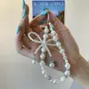 Pingente de corrente de celular com laço de pérola cravejado de diamantes, chaveiro, acessório, pingente de bolsa, decoração feita à mão com contas
