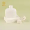 Botella Vacía Portátil de Material PE con Cuerpo de Presión para Loción Corporal Cosméticos al por Mayor Plana Redonda Gordita Tapa de Presión abatible Botella de Loción