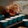 Moji Caja de Regalo Completa Juego de Té de Cerámica Juego de Té Kung Fu Hogareño Color de Mineral Crudo Esmalte Tazón con Tapa Jiqing