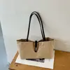 Bolsa de lona grande para mujer, nuevo modelo 2026, de alta gama, lujo ligero, nicho, versátil para ir al trabajo, de hombro y de mano
