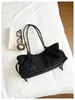 Bolso de axila retro casual de alta gama para mujer, nuevo bolso tote de diseño de nicho elegante, bolso de hombro y de mano
