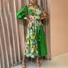 2026 Verano Nuevo Estilo Transfronterizo Europeo y Americano Comercio Exterior Ropa de Mujer Casual y Elegante Vestido Estampado con Cuello en V y Cinturón