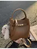Bolso retro de moda para mujer, nuevo modelo primavera 2026, bolso de hombro y cruzado casual versátil de alta gama
