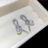 Pendientes de Perla Nudo con Circonita de Aguja Plateada, Estilo Fresco, Elegantes de Nicho, Pendientes Versátiles, Lujo Accesible y Pendientes de Gama Alta