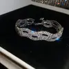 Pulseira Redonda Europeia e Americana Transfronteiriça com Borla e Cravejada de Diamantes, Pulseira Minimalista Moderna de Estilo Nicho com Design Único, Joia de Mão de Nicho