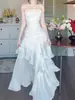 Vestido de longitud de pastel estilo resort de playa 2026 Verano Nuevo Estilo Francés Blanco con Volantes de Satén con Tirantes para Mujer