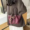 Bolsa de mano retro de alta gama para mujer, nuevo modelo 2026, diseño único, bolso de hombro no convencional, bolso de mano para el día a día