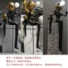Lámpara de escultura abstracta de bola de personaje Lámpara de sala de exposiciones lámpara de oficina de ventas de hotel Lámpara de decoración artística lámpara de león lámpara de pie con forma humana