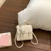 Mochila de Alta Qualidade Estilo Academia com Fivelas Duplas 2026 Nova Moda Versátil Bolsa de Mão para o Dia a Dia Bolsa de Ombro com Relevo