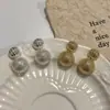 Pendientes de Bola Metálica con Puntos de Ola Retro Exquisitos Franceses Moda Europea y Americana Elegante Estilo Frío Pendientes de Nicho Nuevos