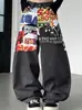 Jeans de Mezclilla Lavada Estilo Retro Americano para Primavera y Otoño para Hombres y Mujeres Pareja Sueltos Casual Versátiles Pierna Recta Estampados Pierna Ancha Pantalones Largos
