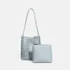 2026 Novo Estilo de Férias de Outono e Verão Bolsa Tecida Vazada Retrô de Couro Macio Bolsa de Mão Cesta Tote Bolsa de Ombro Único Mãe-Filha