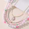 Joias de Inverno Transfronteiriças Novas Pingente de Borboleta Rosa Amor Pérola Imitação Contas de Arroz Colar Infantil Feito à Mão com Contas