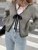 2026 Novo Estilo Transfronteiriço Europeu e Americano Roupas Femininas Temporada Outono e Inverno Cardigã de Tricô Suéter com Cadarço Cor Sólida Solto Manga Longa Top Peça de Roupa Externa