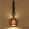 Lámpara de araña tipo jaula de pájaro para restaurante Minimalista moderno Casa de té Restaurante de hot pot Hotel Linterna Retro Gran Aristocrático B&B Lámpara de araña de hierro