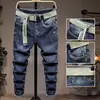 Jeans grossos, modernos e estilosos para homens, estilo Hong Kong, para outono e inverno, com corte reto e folgado, tecido stretch e design europeu e americano.