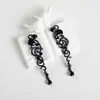 Pendientes Amazon transfronterizos, extragrandes, electrochapados, elegantes, de estilo largo, con un toque de alta gama, adornados con borlas y pedrería negra