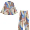 Roupas femininas europeias e americanas transfronteiriças, top listrado casual da moda mais vendido no AliExpress com detalhe de nó + calça de perna reta