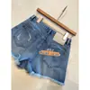 Pantalones de Mezclilla Rasgados de Moda Cintura Alta Corte A Adelgazantes Shorts Casuales de Mezclilla Pantalones Cortos Calientes para Mujer Verano 2026 Modelo Nuevo H052305
