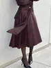Nova Saia Assimétrica de Couro PU de Cintura Alta Outono/Inverno 2026, Saia Evasê Vinho Tinto Retrô Francesa para Mulheres, Estilo Vintage