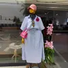 Ropa Femenina Transfronteriza Europea y Americana 2026 Verano Nueva Moda Conjunto de Camisa Azul a Rayas Holgada y Falda con Cintura de Corbata